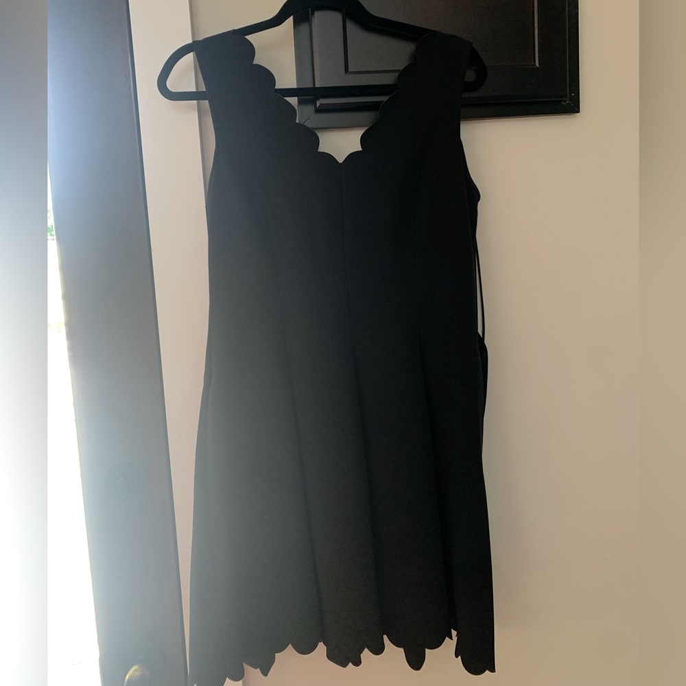 Black dress with scalloped collar